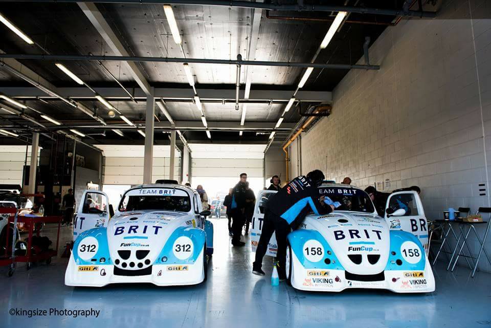 Both cars in garage